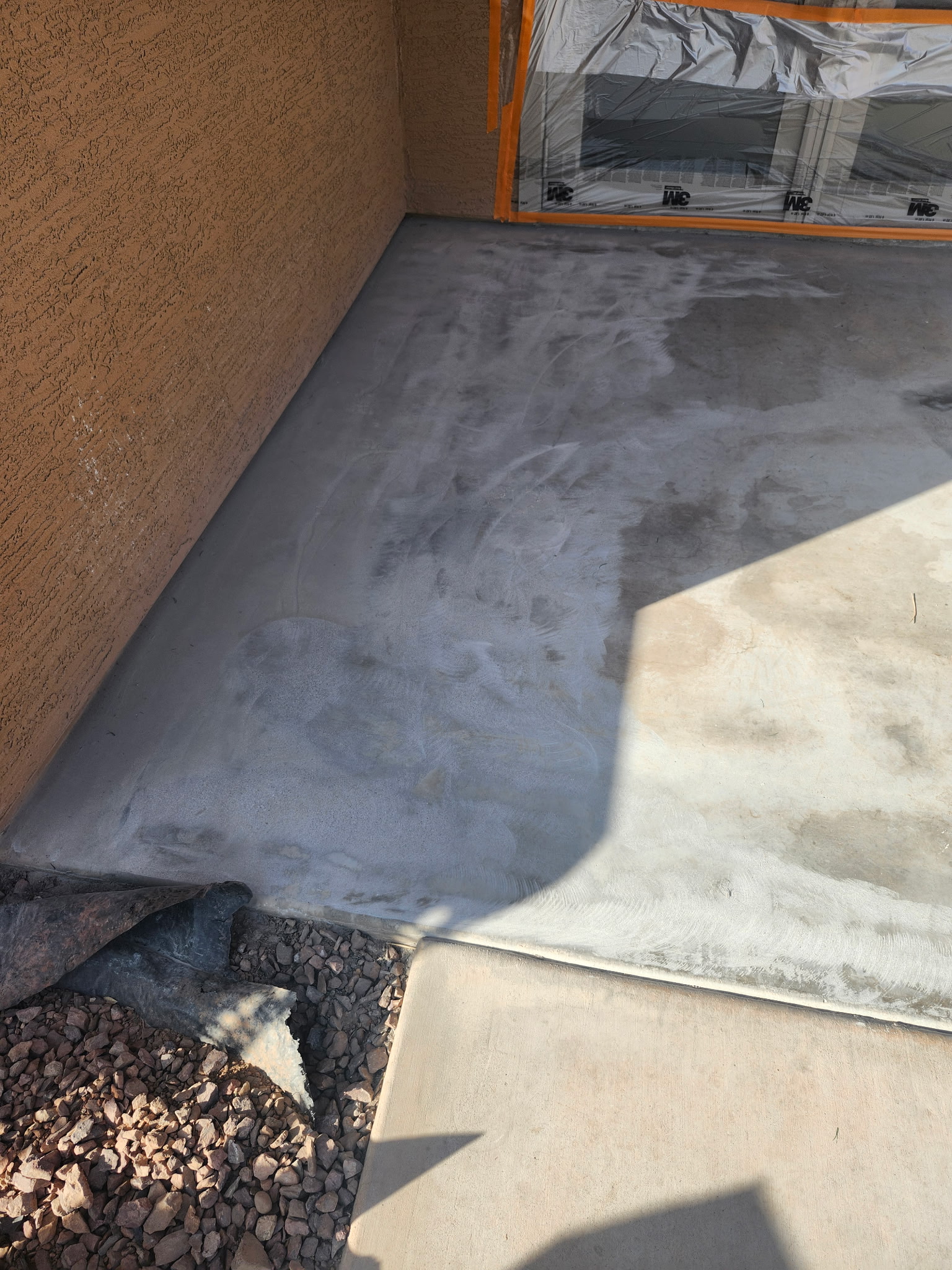 Concrete patio slab before flake floor coating
